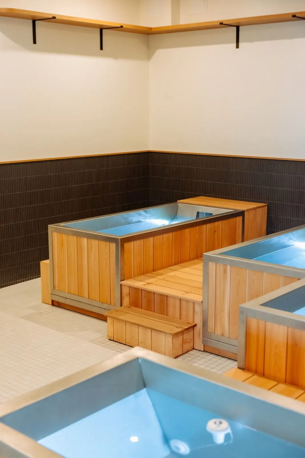 Cedar and steel cold plunge tubs at The Good Spot
