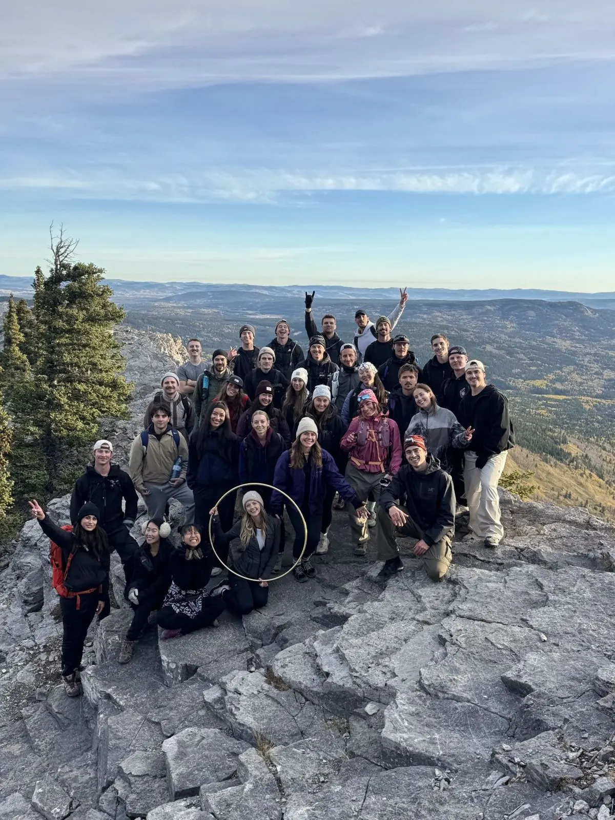 Big group photo at the summit from a Good Spot community hike
